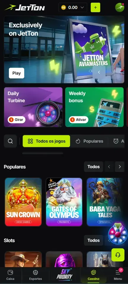 Lobby da Jetton no celular com saldo em R$, banner Exclusively on JetTon com botão Play, cartões Daily Turbine e Weekly bonus, fileira Populares e barra inferior de Caixa a Menu